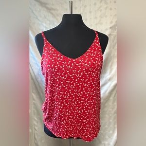 4 x Ricki’s XL tank tops.